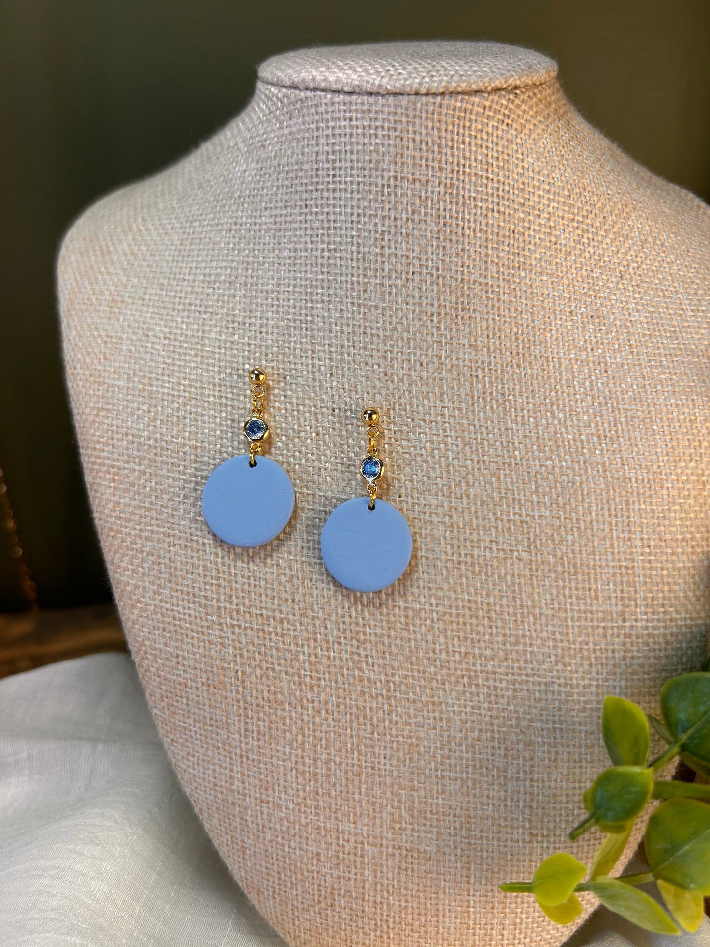Blue Skies Round Dangles with light Blue Gem