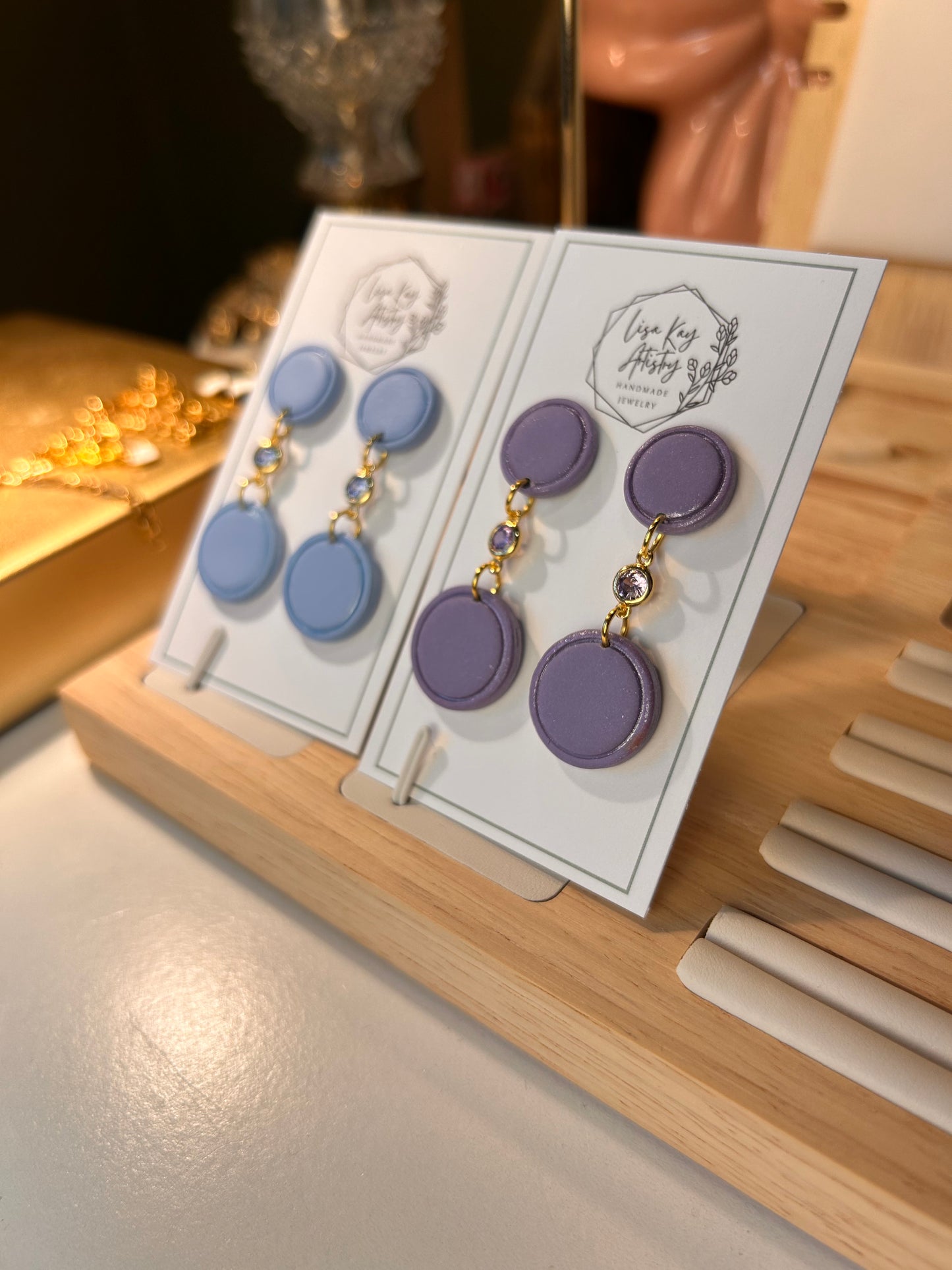 Small Blue Skies Round Dangles with light Blue Gem