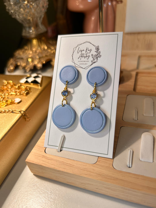 Small Blue Skies Round Dangles with light Blue Gem