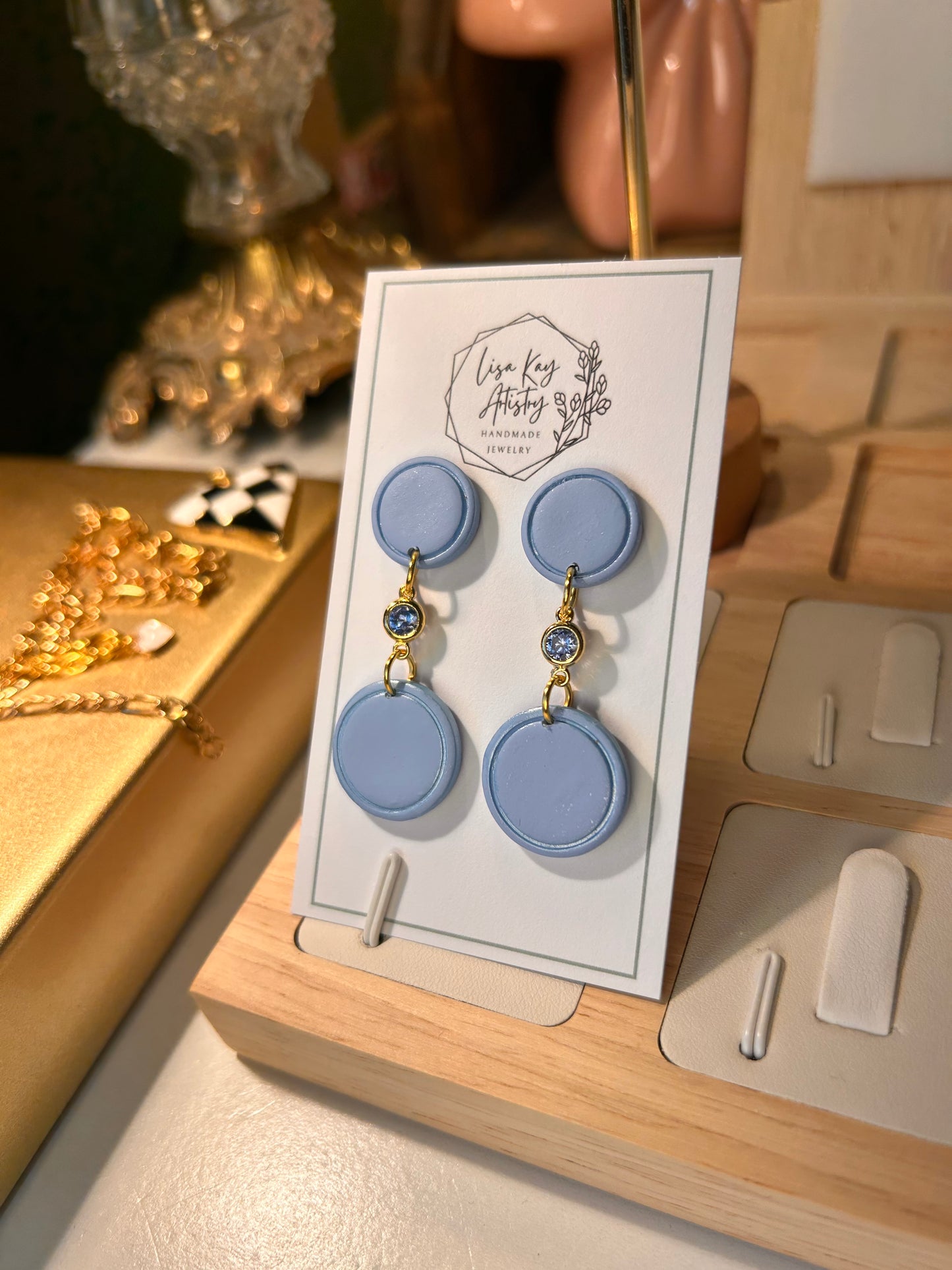 Small Blue Skies Round Dangles with light Blue Gem