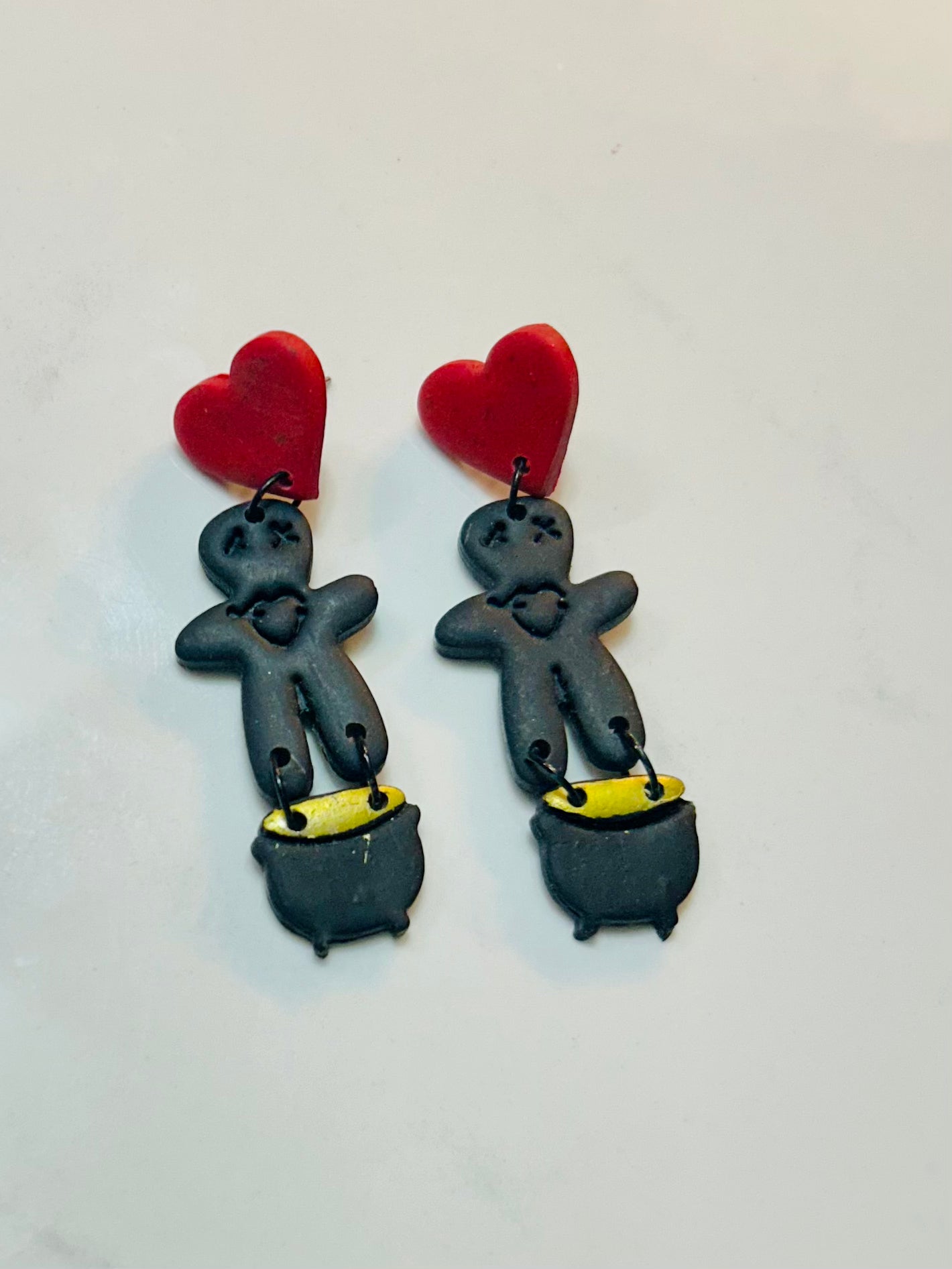 Voodoo dolls with heart stud