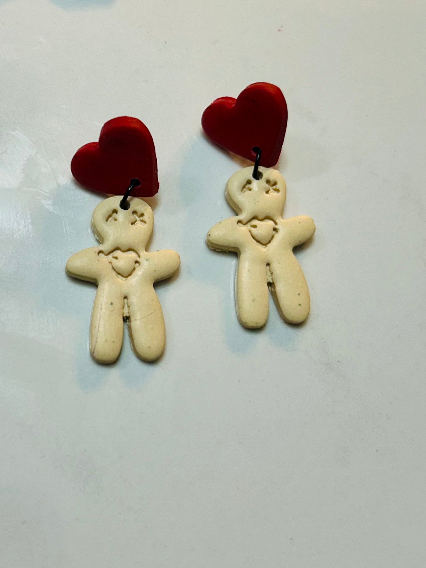 Voodoo dolls with heart stud