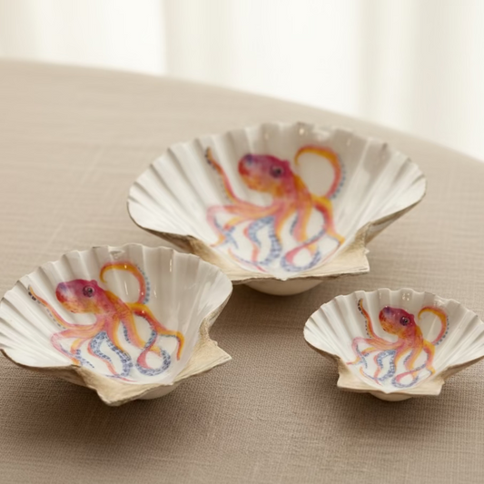 Decorative shell with a colorful octopus design on a beige surface